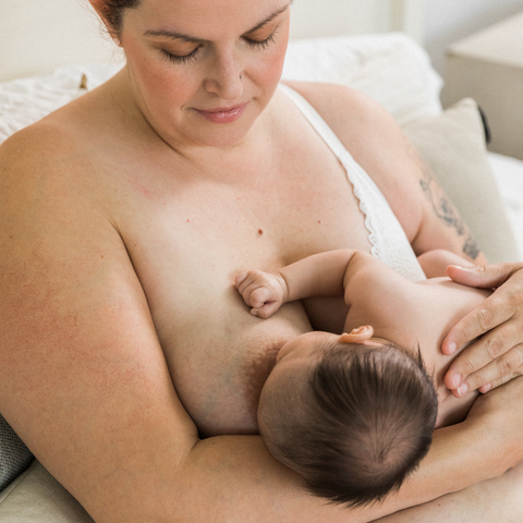 Cradle breastfeeding hold position; breastfeeding position for newborns