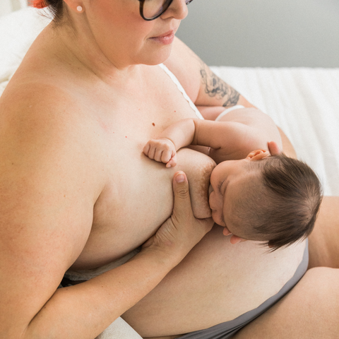 Cross-cradle breastfeeding hold position; breastfeeding position for twins and smaller babies