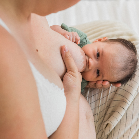 Football breastfeeding hold position; a great breastfeeding position for c-section and twins